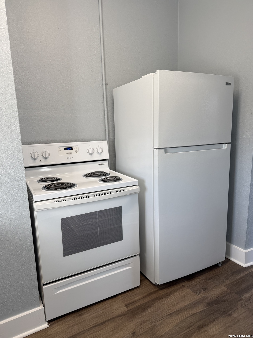 917 South 4th Street Temple, TX 76504 - Photo 19 of 33 a white refrigerator freezer sitting inside of a kitchen