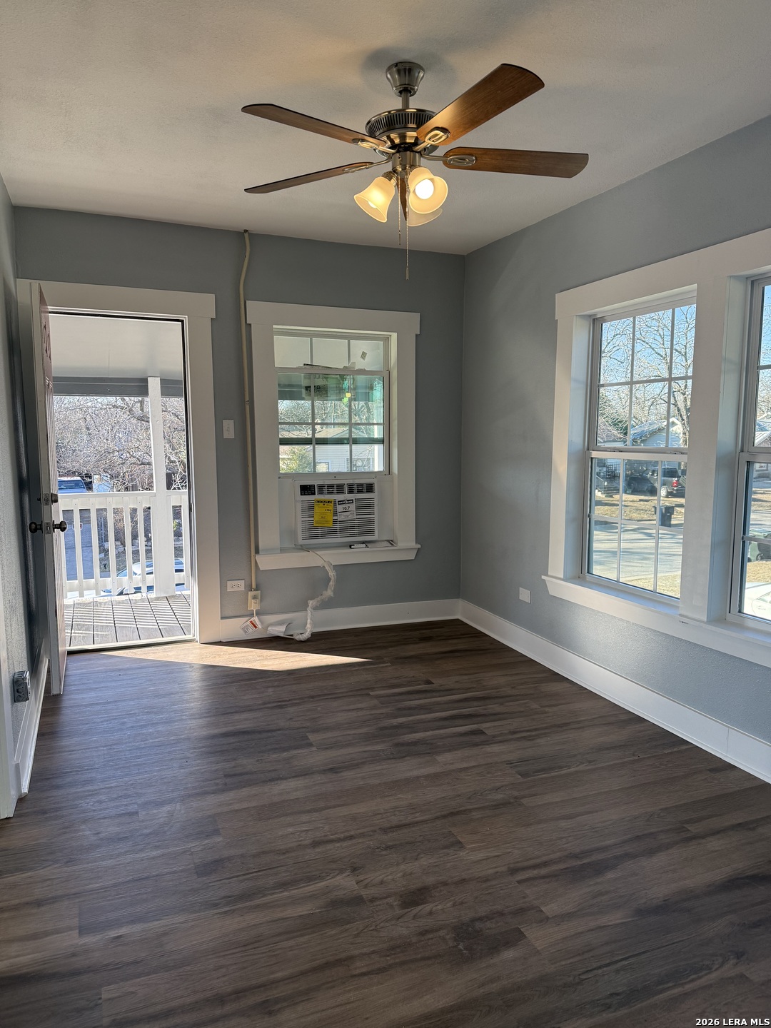 917 South 4th Street Temple, TX 76504 - Photo 21 of 33 a view of an empty room with wooden floor and a window