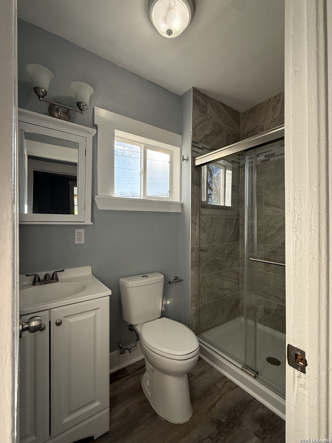 917 South 4th Street Temple, TX 76504 - Photo 28 of 33 a bathroom with a toilet a sink and shower