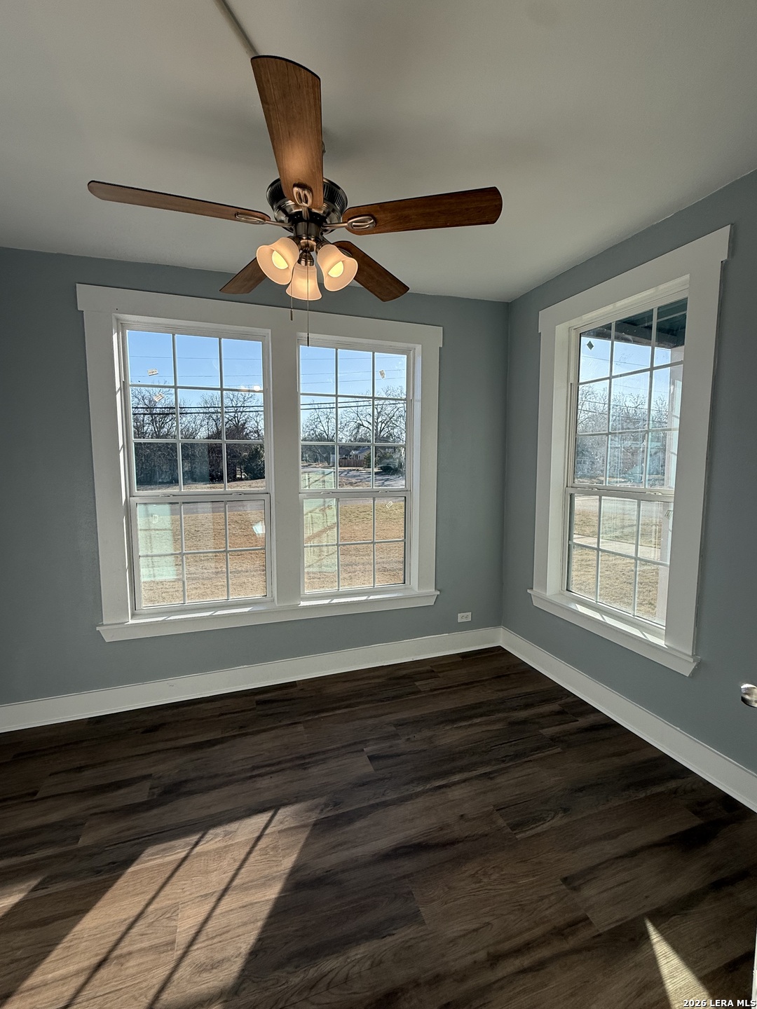 917 South 4th Street Temple, TX 76504 - Photo 29 of 33 a view of an empty room with wooden floor and a window