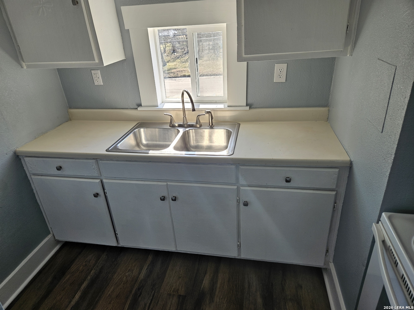 917 South 4th Street Temple, TX 76504 - Photo 9 of 33 a room with a sink and cabinets