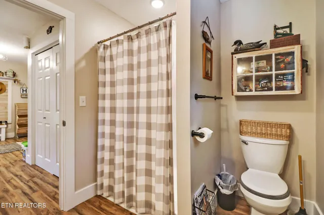a view of a yard with a tree and a table