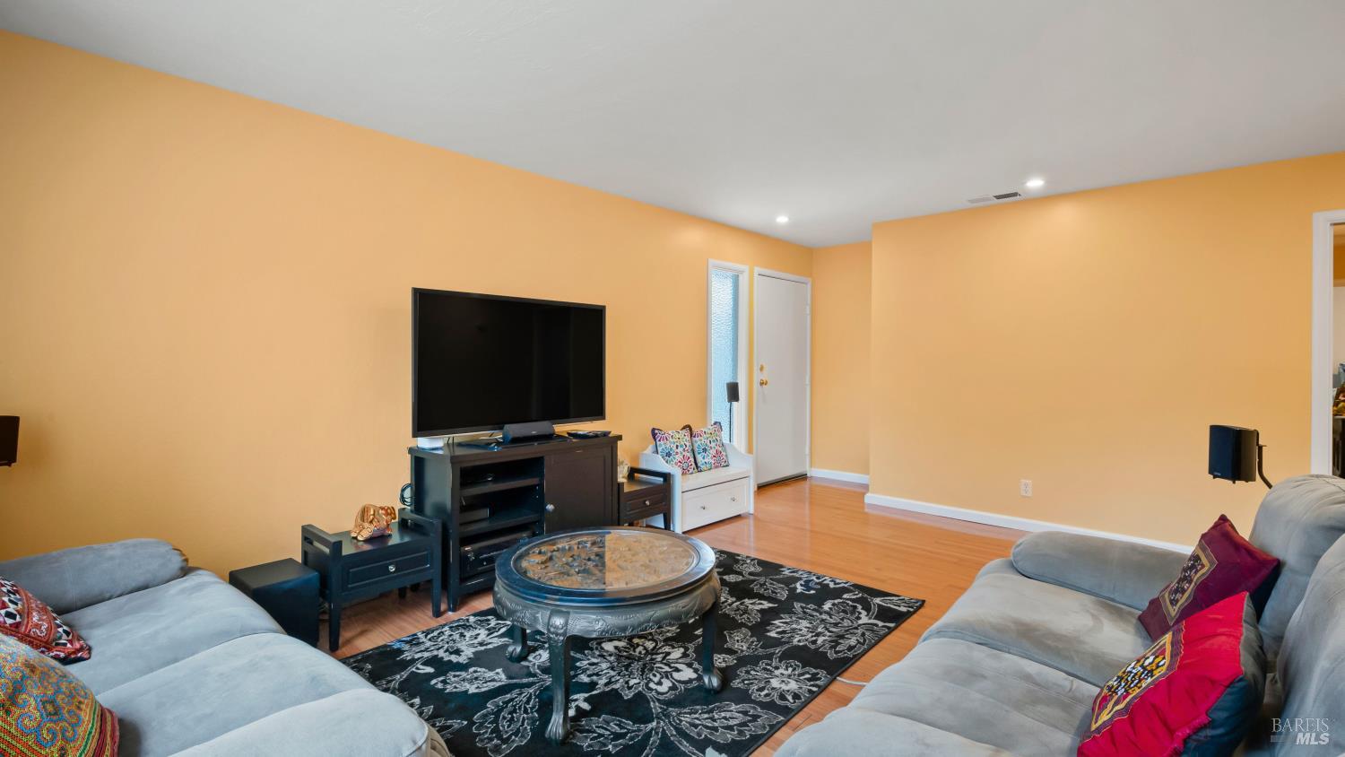 7 Portola Court Santa Rosa, CA 95409 - Photo 11 of 39 a living room with furniture and a flat screen tv