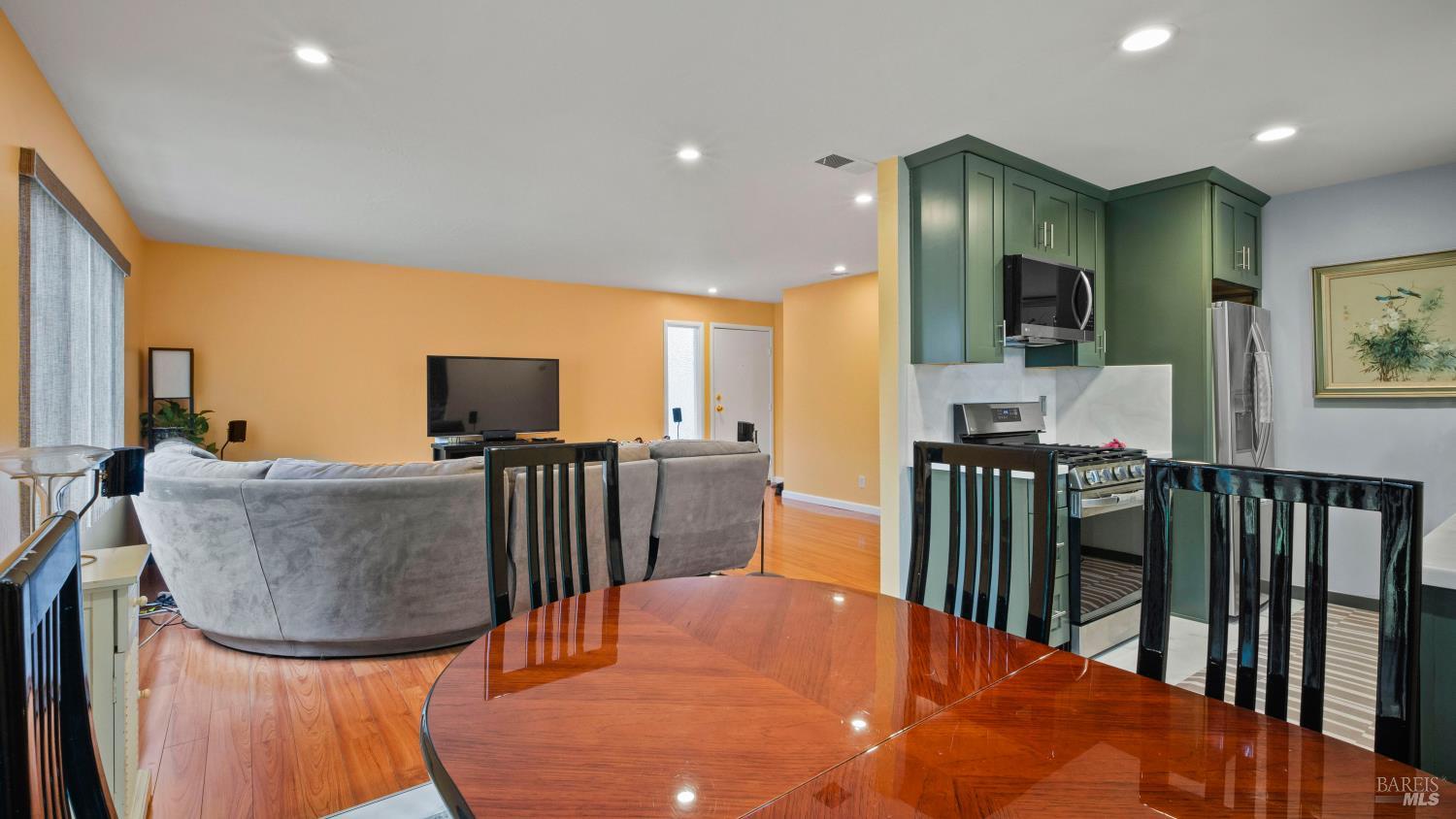 7 Portola Court Santa Rosa, CA 95409 - Photo 14 of 39 a living room with furniture and a flat screen tv