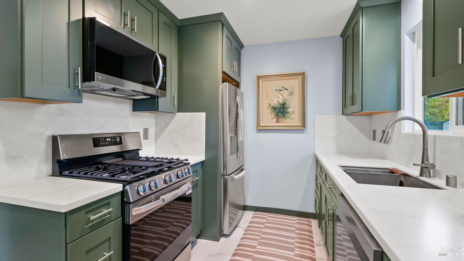 7 Portola Court Santa Rosa, CA 95409 - Photo 15 of 39 a kitchen that has a sink and a stove top oven