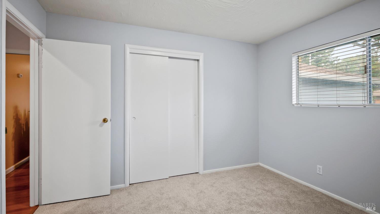 7 Portola Court Santa Rosa, CA 95409 - Photo 24 of 39 a view of an empty room with a window