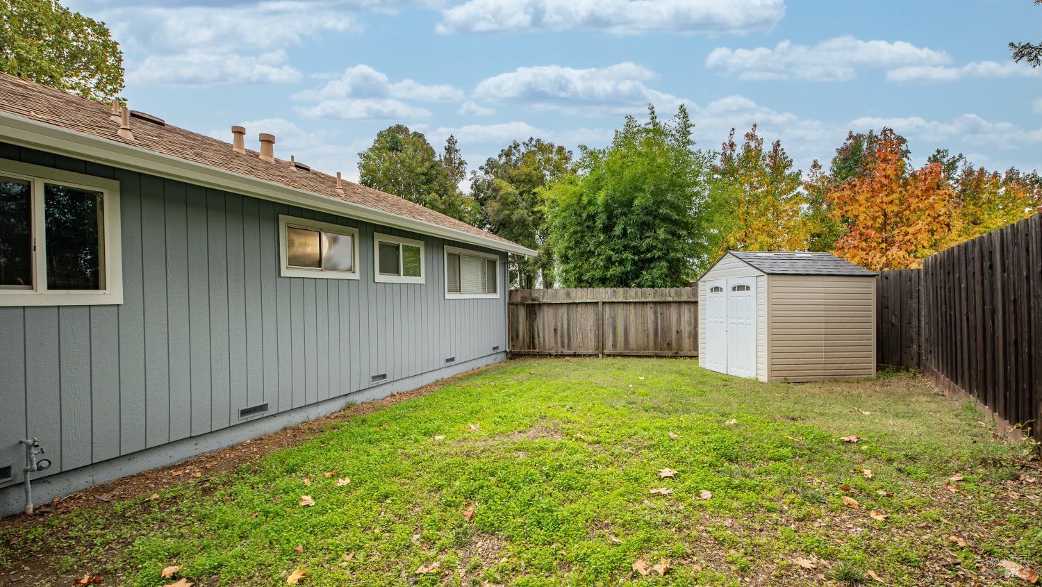 7 Portola Court Santa Rosa, CA 95409 - Photo 27 of 39 a view of a house with a yard and large tree