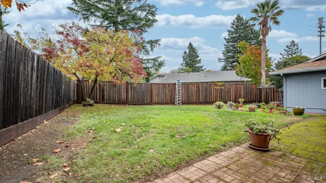 a front view of house with yard and seating area