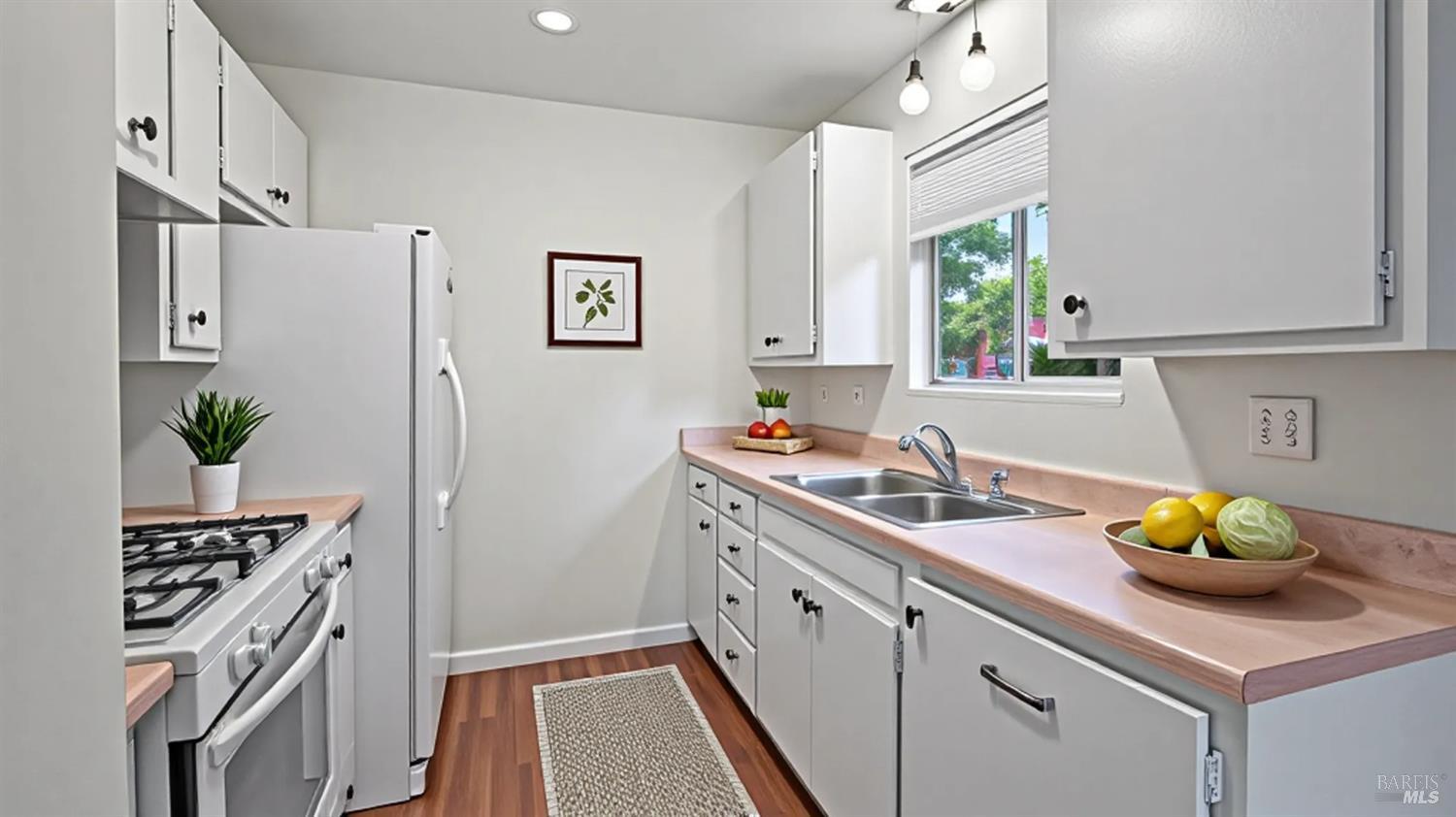 7 Portola Court Santa Rosa, CA 95409 - Photo 35 of 39 a kitchen with a sink appliances and cabinets
