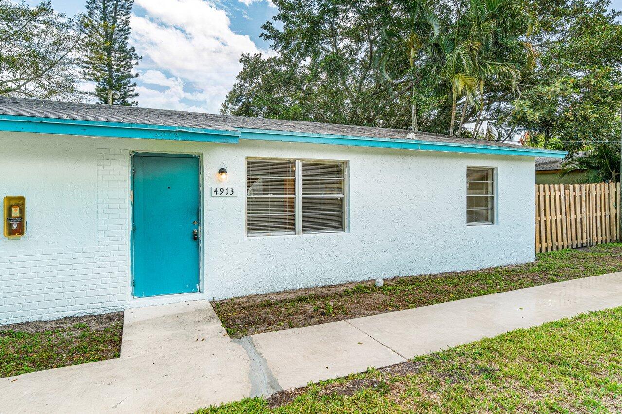 4913 Gulfstream Road Lake Worth, FL 33461 - Photo 2 of 20 002-4913GulfstreamRoad-LakeWorth-FL-3346
