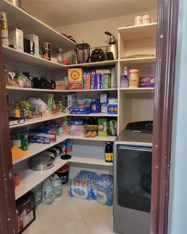 a room with storage and utility