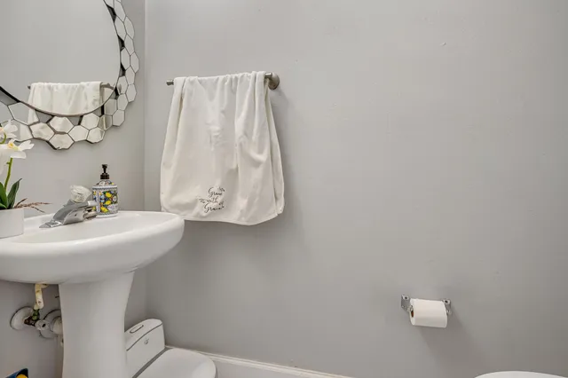 a bathroom with a sink and mirror