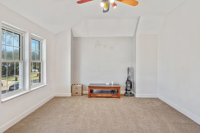 a room with a window and a lamp