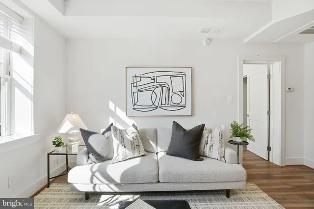 a view of a livingroom with furniture