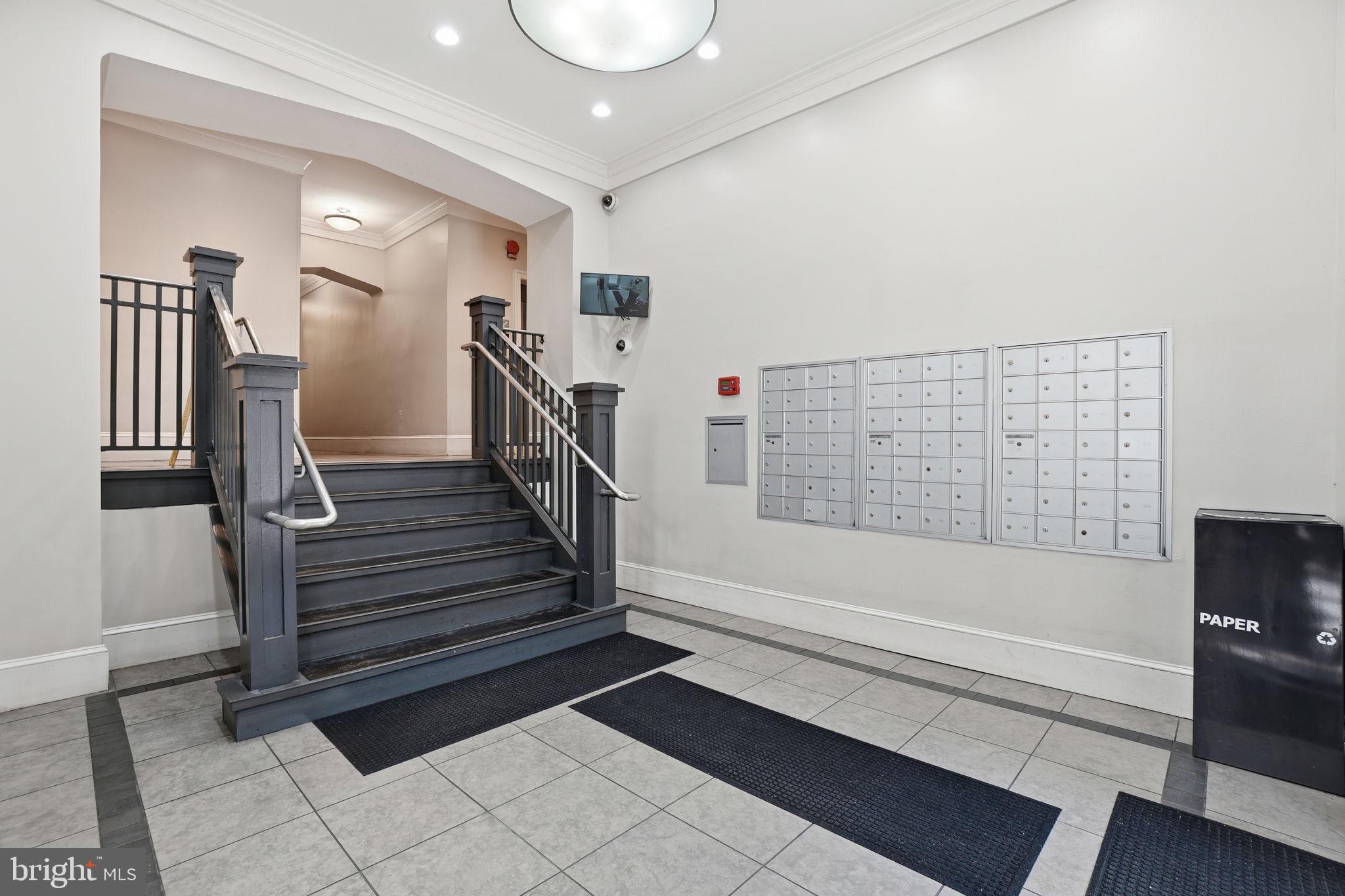 1451 Park Road Northwest, Unit 114 Washington, DC 20010 - Photo 5 of 23 a view of entryway with wooden floor