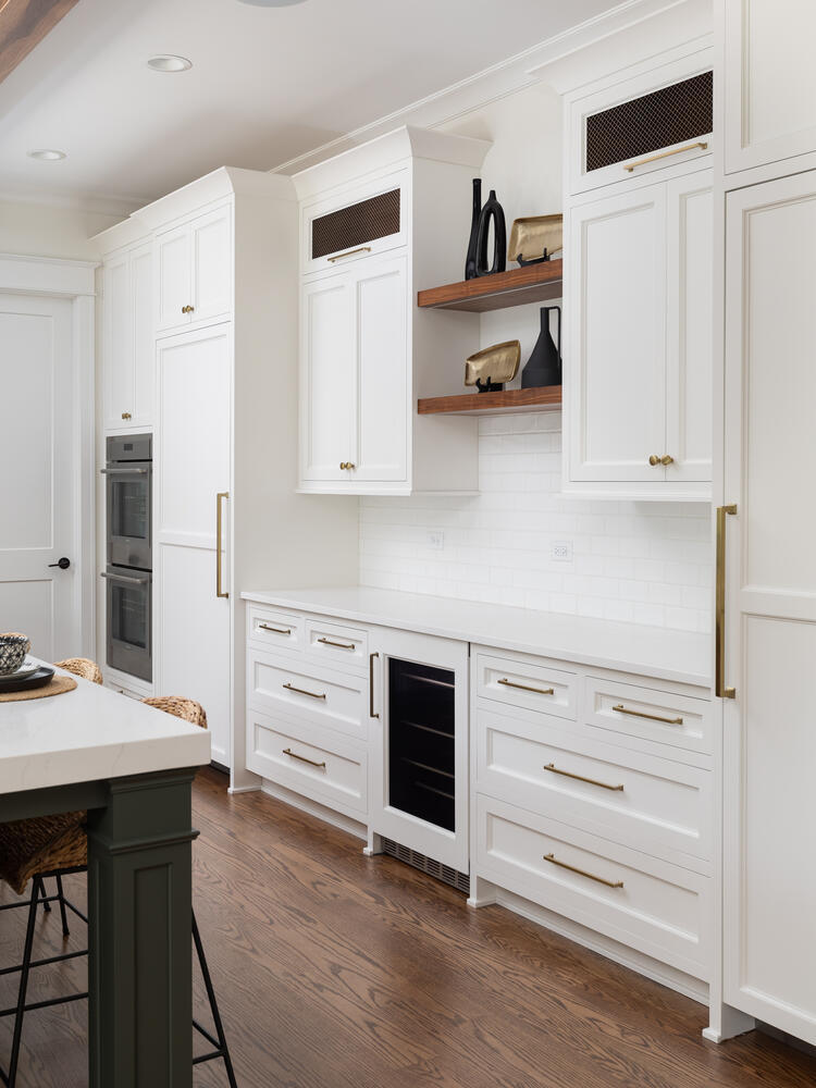 706 South Loomis Street Naperville, IL 60540 - Photo 17 of 43 a kitchen with white cabinets and appliances