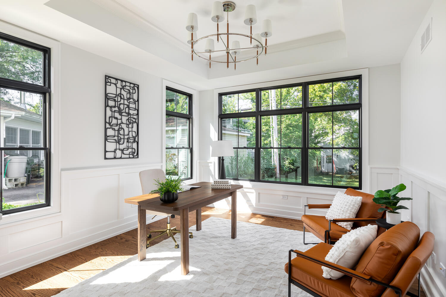706 South Loomis Street Naperville, IL 60540 - Photo 21 of 43 a living room with furniture and a large window