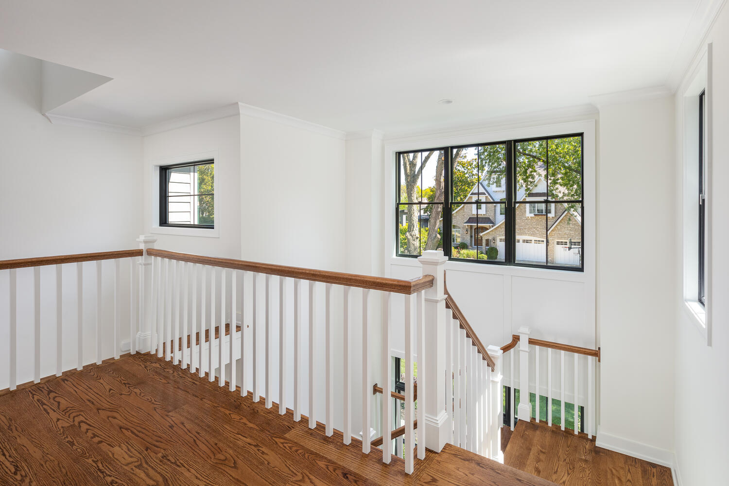 706 South Loomis Street Naperville, IL 60540 - Photo 24 of 43 a view of a hallway with windows