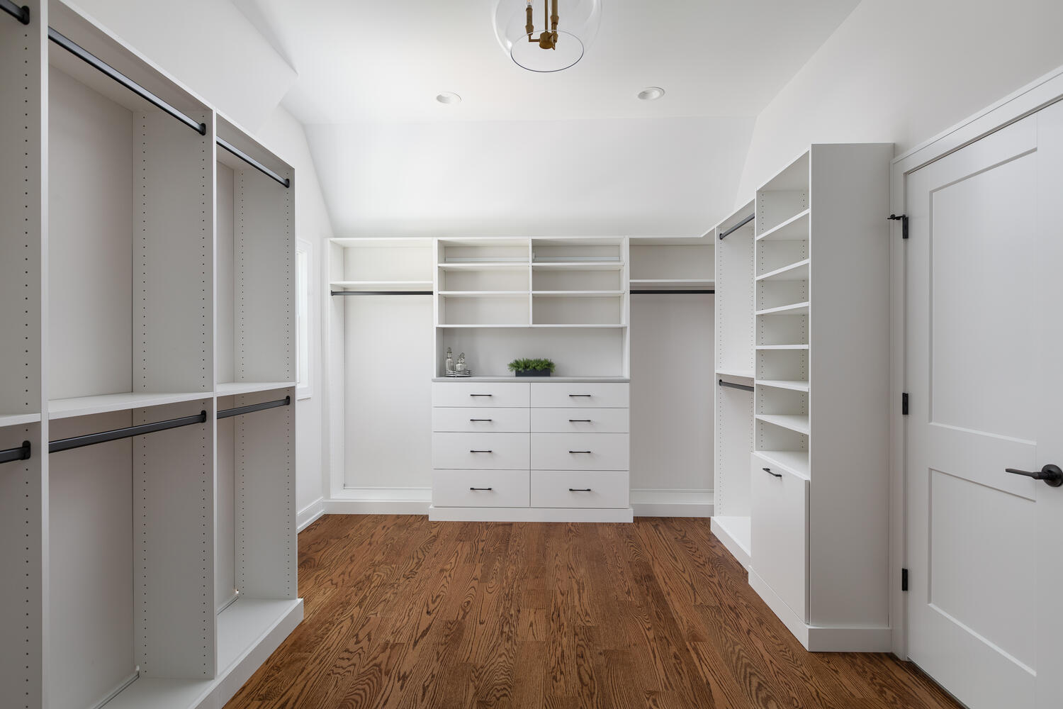 706 South Loomis Street Naperville, IL 60540 - Photo 27 of 43 a view of walk in closet with empty racks