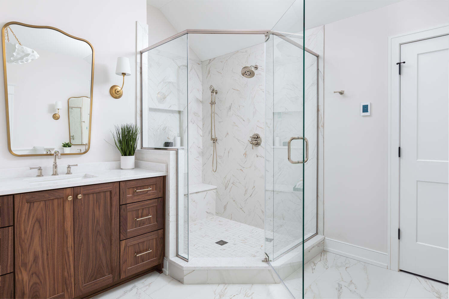 706 South Loomis Street Naperville, IL 60540 - Photo 30 of 43 a bathroom with a shower sink and mirror