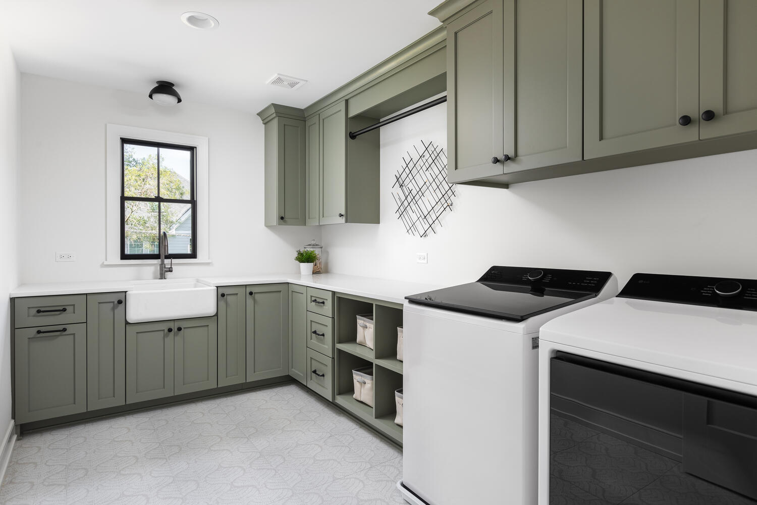 706 South Loomis Street Naperville, IL 60540 - Photo 31 of 43 a utility room with cabinets washer and dryer