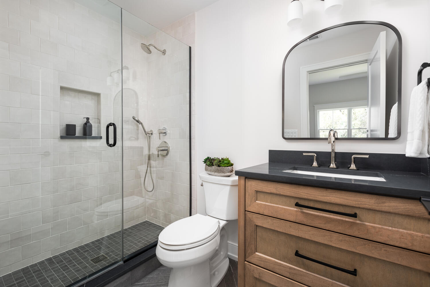 706 South Loomis Street Naperville, IL 60540 - Photo 35 of 43 a bathroom with a granite countertop sink a toilet and shower