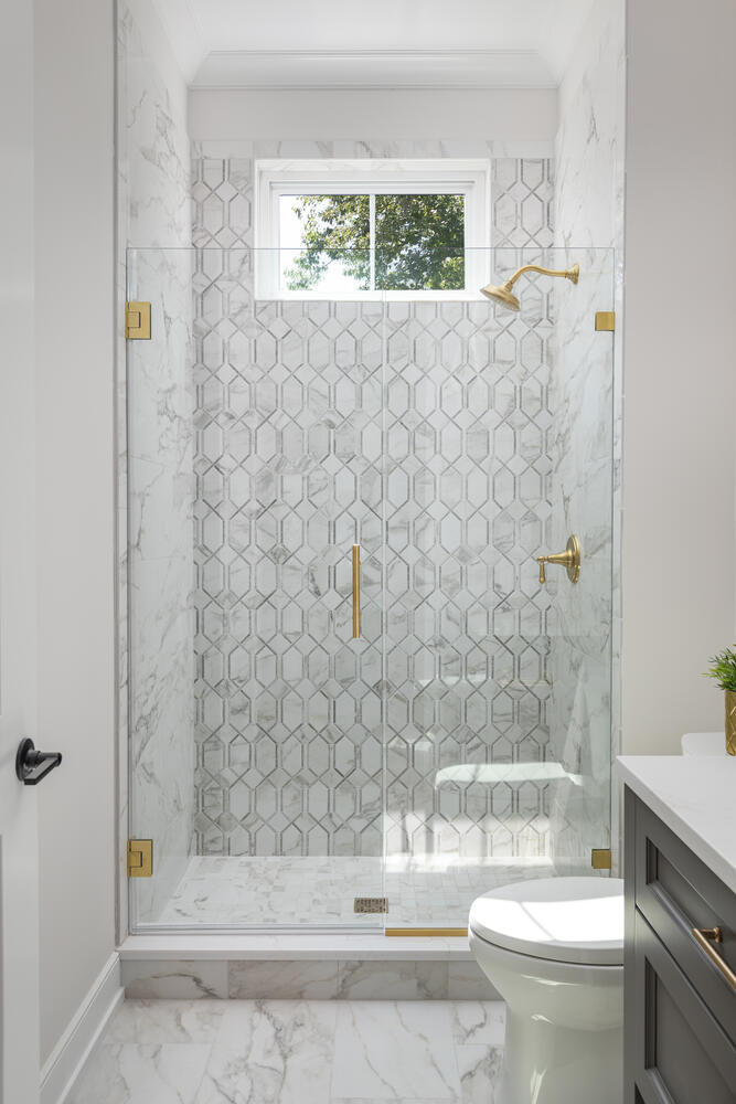 706 South Loomis Street Naperville, IL 60540 - Photo 39 of 43 a bathroom with a granite countertop bathtub toilet and sink