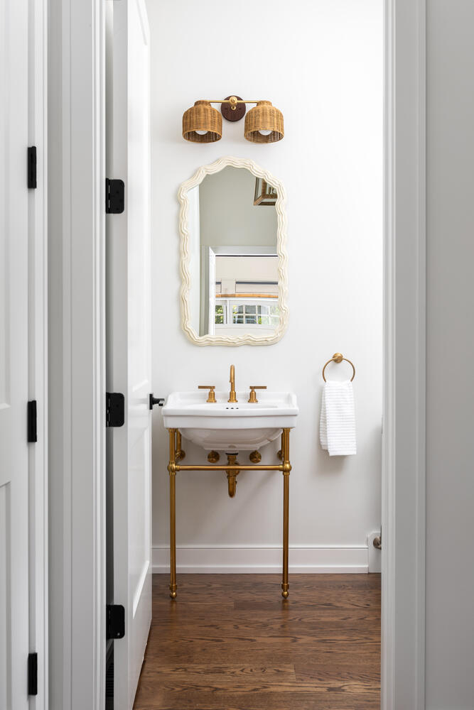 706 South Loomis Street Naperville, IL 60540 - Photo 42 of 43 a bathroom with a sink and a mirror