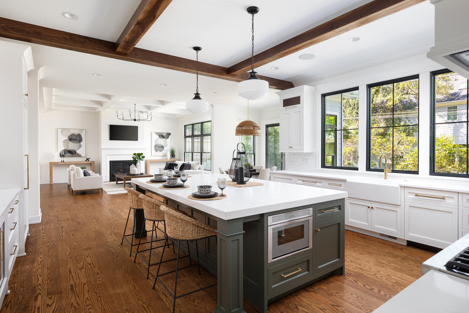 706 South Loomis Street Naperville, IL 60540 - Photo 9 of 43 a kitchen with a stove a sink dishwasher and a fireplace with wooden floor