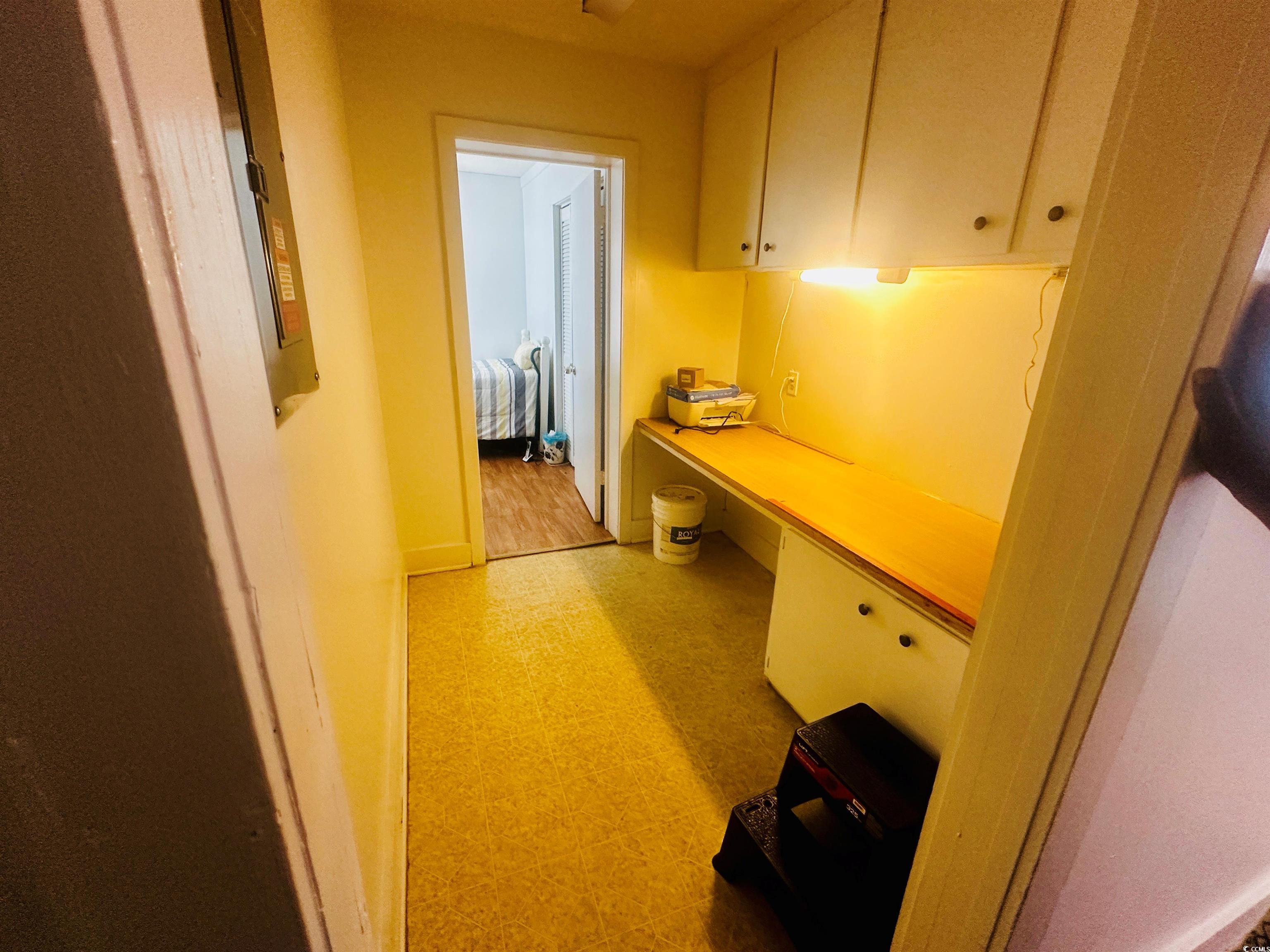 8 Raymond Street Andrews, SC 29510 - Photo 8 of 13 Hall featuring light flooring and electric panel