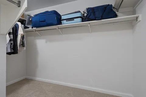 a view of a balcony with wooden floor