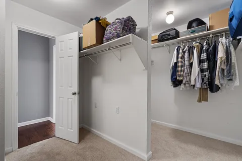a front view of a house with a large window