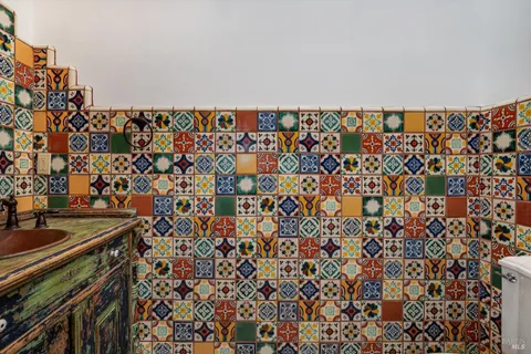 a bathroom with a sink and a window