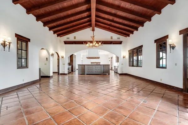 a kitchen with stainless steel appliances granite countertop counter space a sink and a stove
