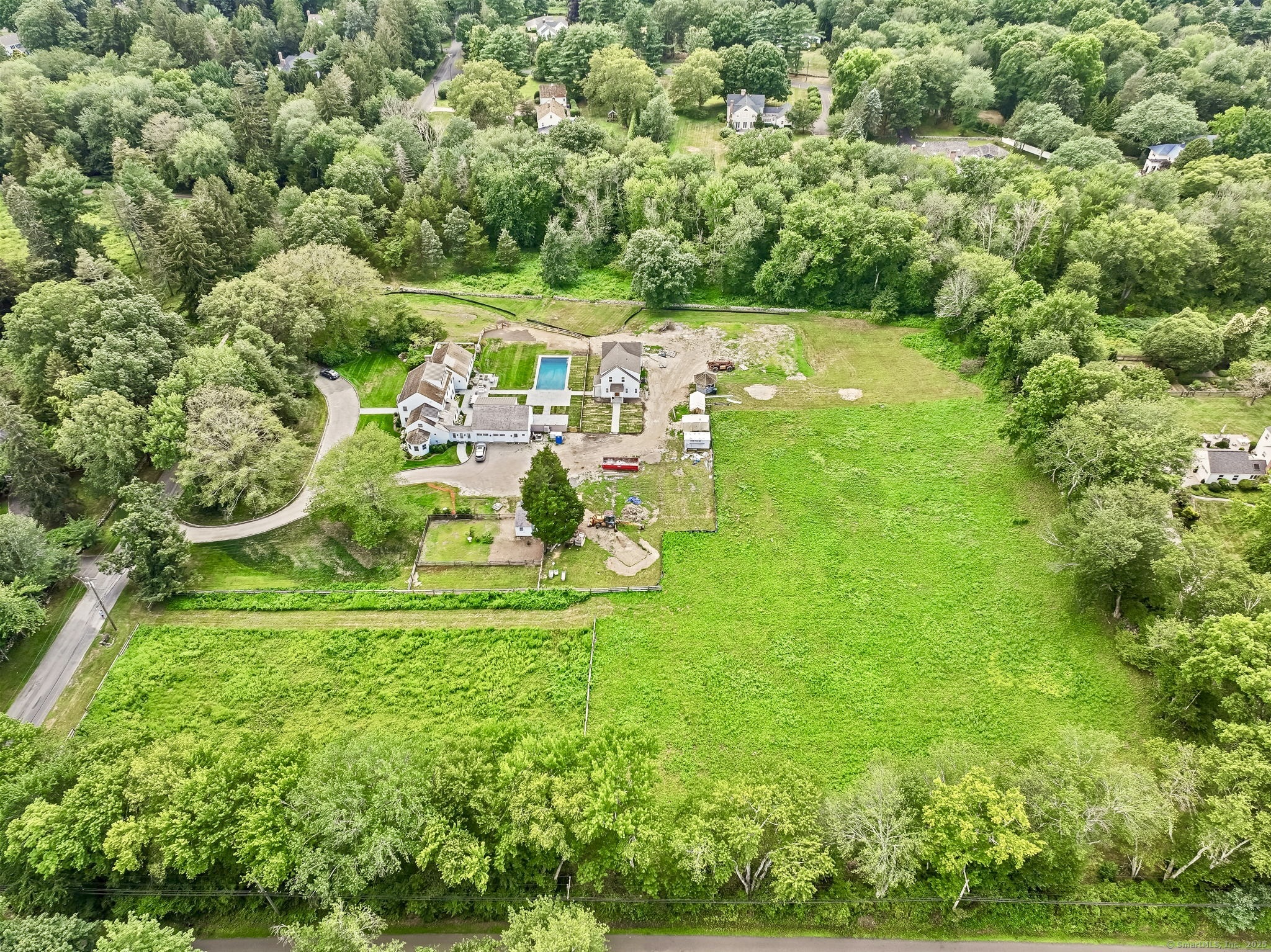 22 Brett Road Fairfield, CT 06824 - Photo 4 of 4 an aerial view of residential houses with outdoor space and trees