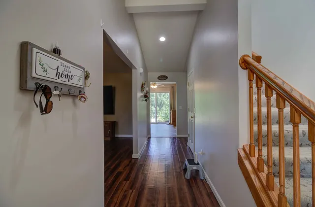a view of gallery with wooden floor