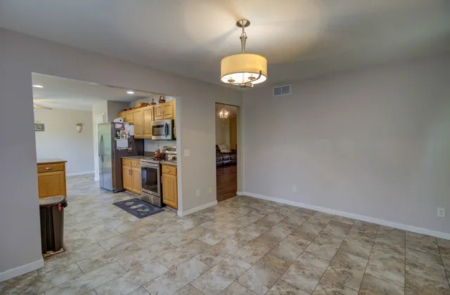 a view of a kitchen with a sink