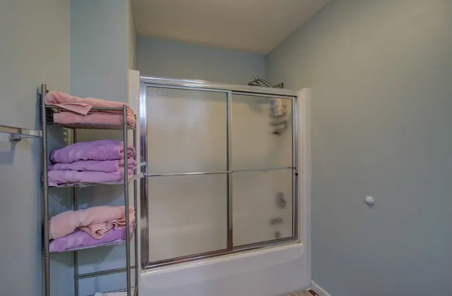 a utility room with pink walls