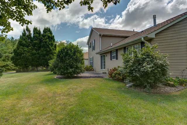 a house view with a garden space
