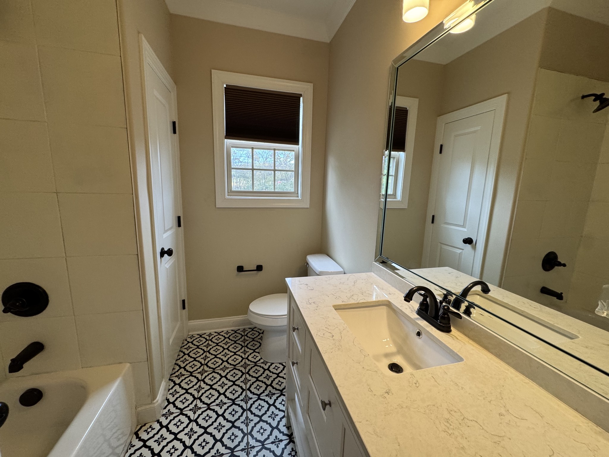 2006 Eagle View Road Hendersonville, TN 37075 - Photo 12 of 28 a bathroom with a sink toilet a shower and a mirror