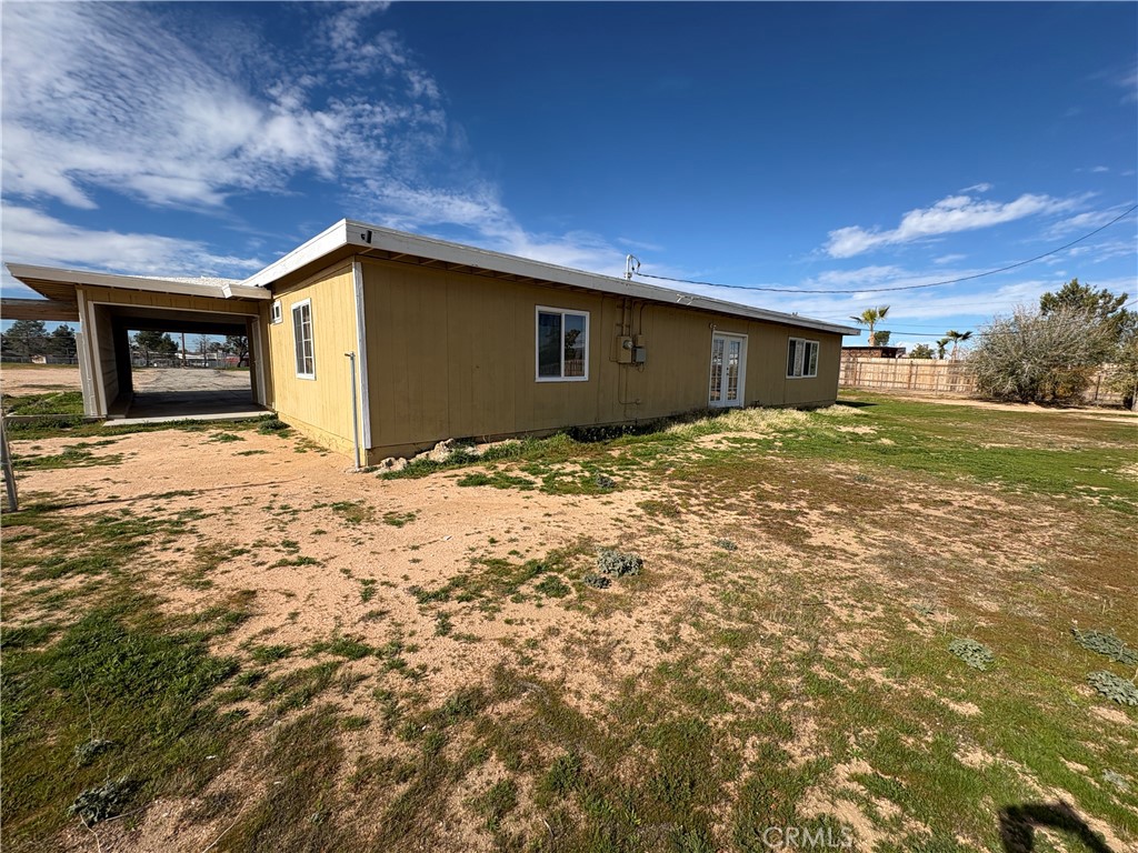 14027 Navajo Road Apple Valley, CA 92307 - Photo 22 of 25 a view of a backyard