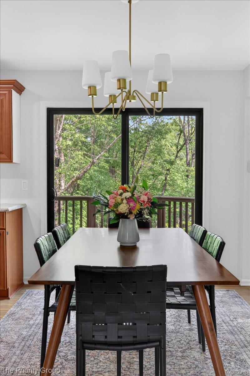 517 Deer Valley Road Holly, MI 48442 - Photo 20 of 61 Dining room with door-wall to back deck