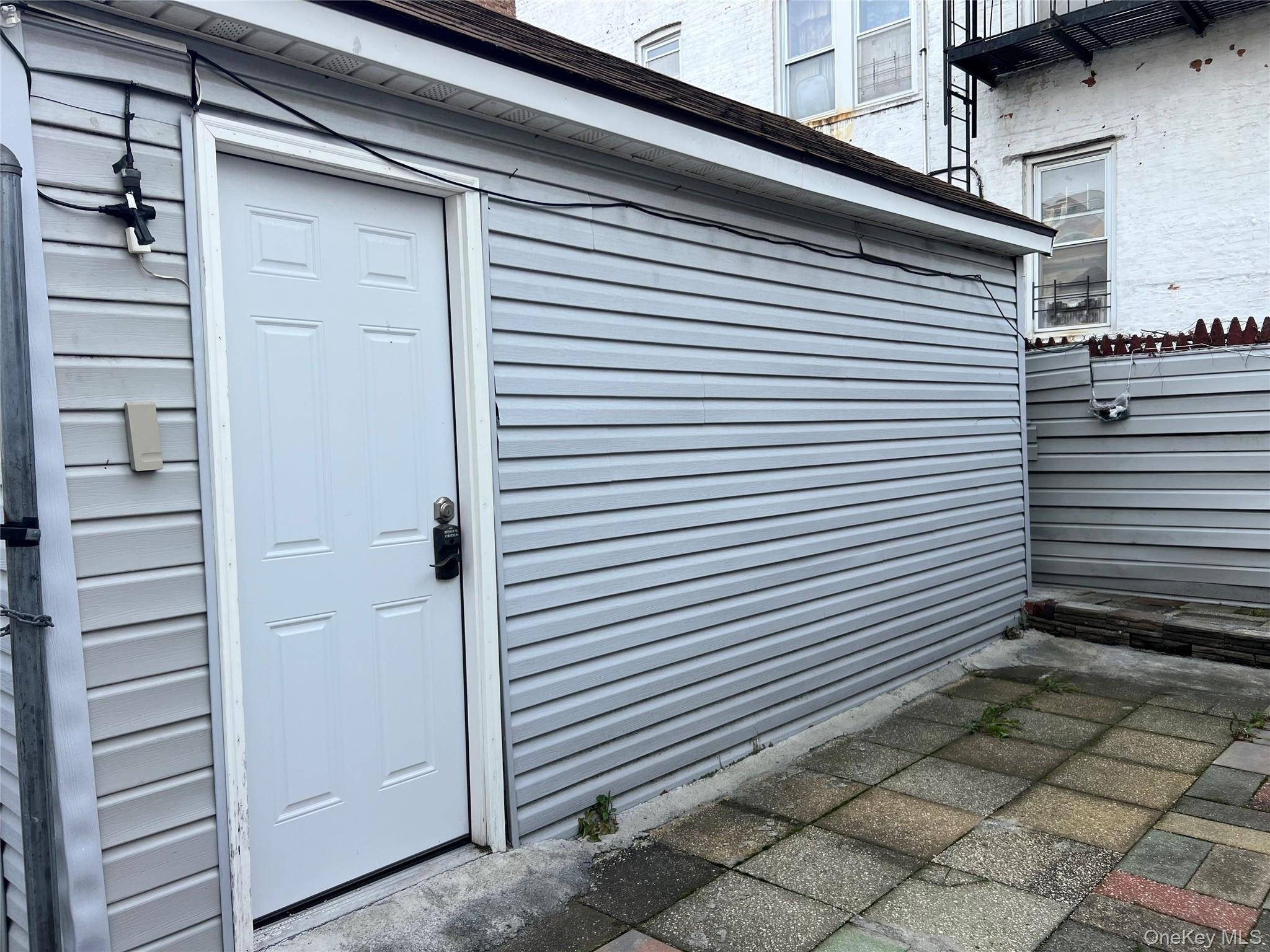 151-08 33rd Road Queens, NY 11354 - Photo 12 of 22 a view of a utility room with brick walls