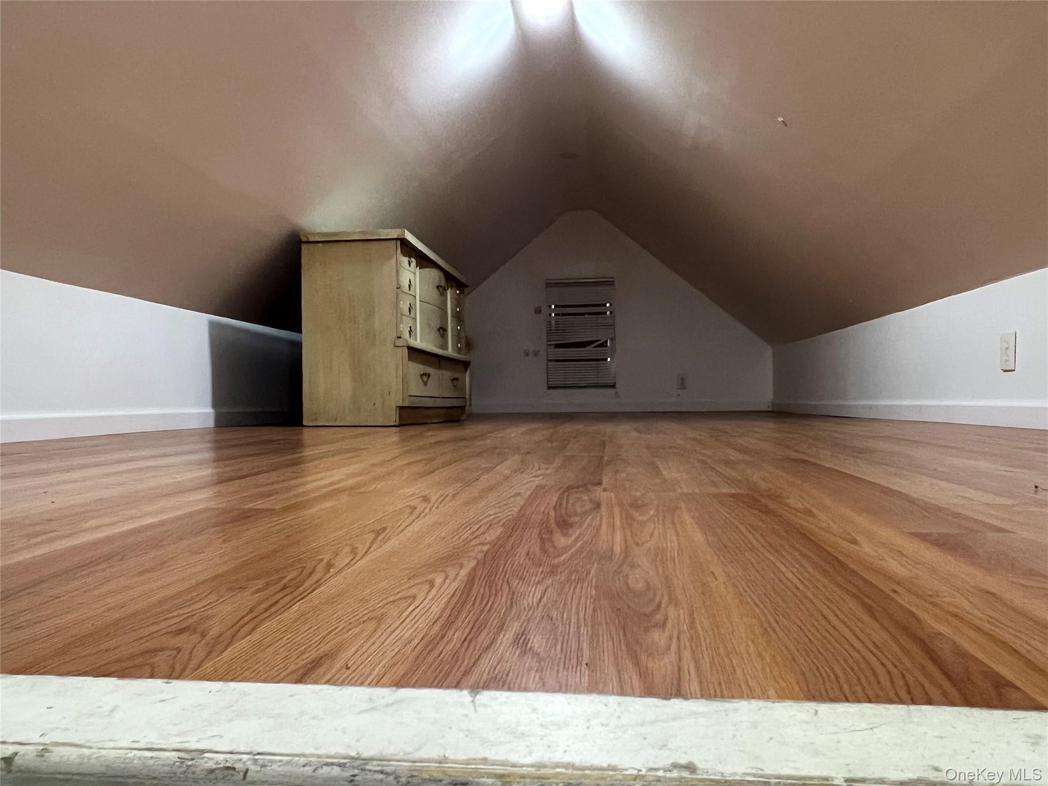 151-08 33rd Road Queens, NY 11354 - Photo 10 of 22 a view of a room with wooden floor