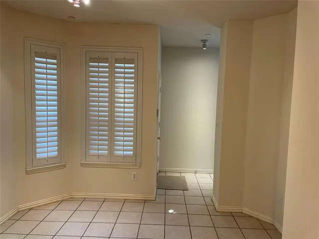 a view of an empty room with window