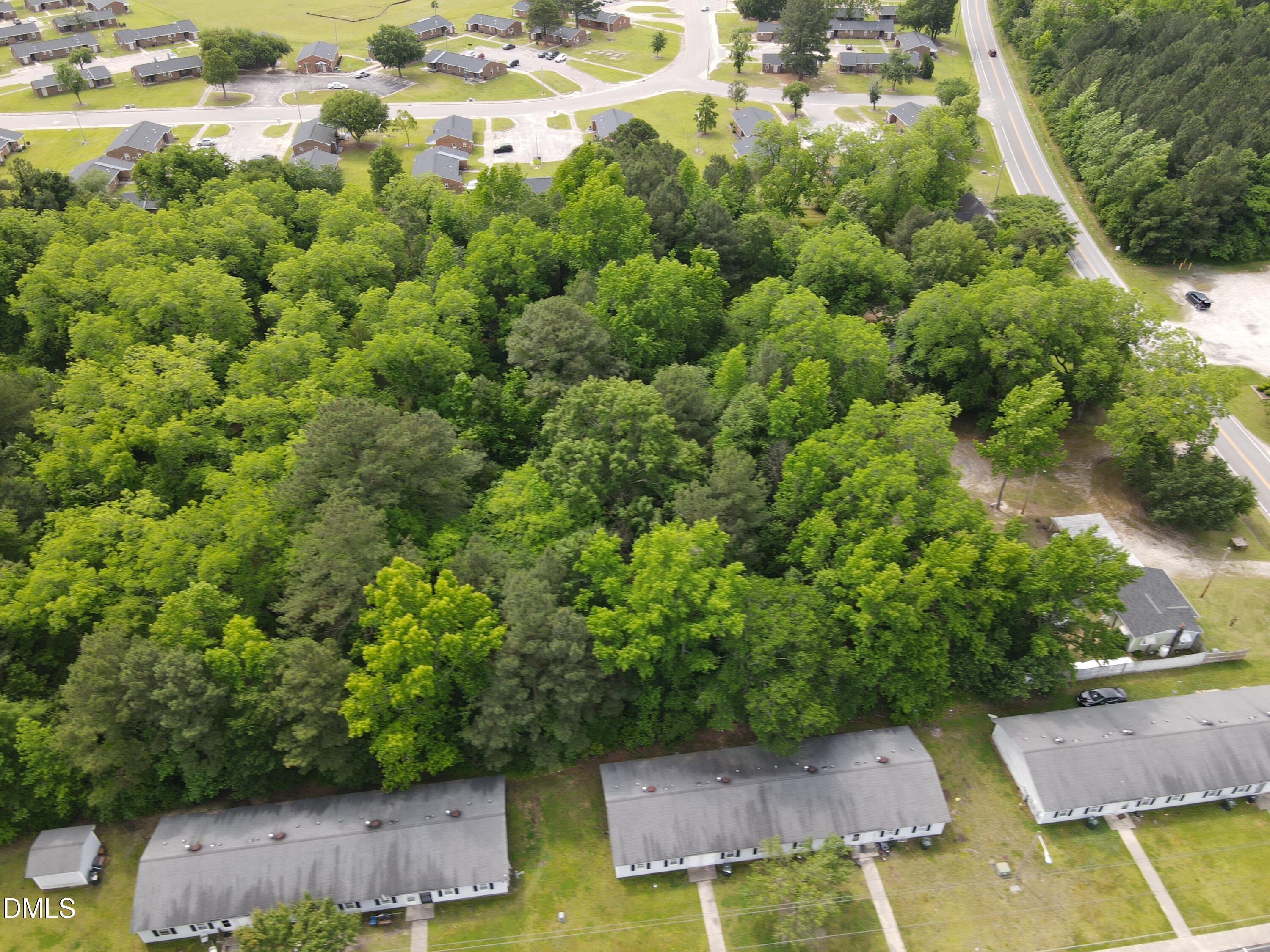 1708-1710 London Church Road Northeast Wilson, NC 27893 - Photo 25 of 27 an aerial view of a house with yard swimming pool and outdoor seating