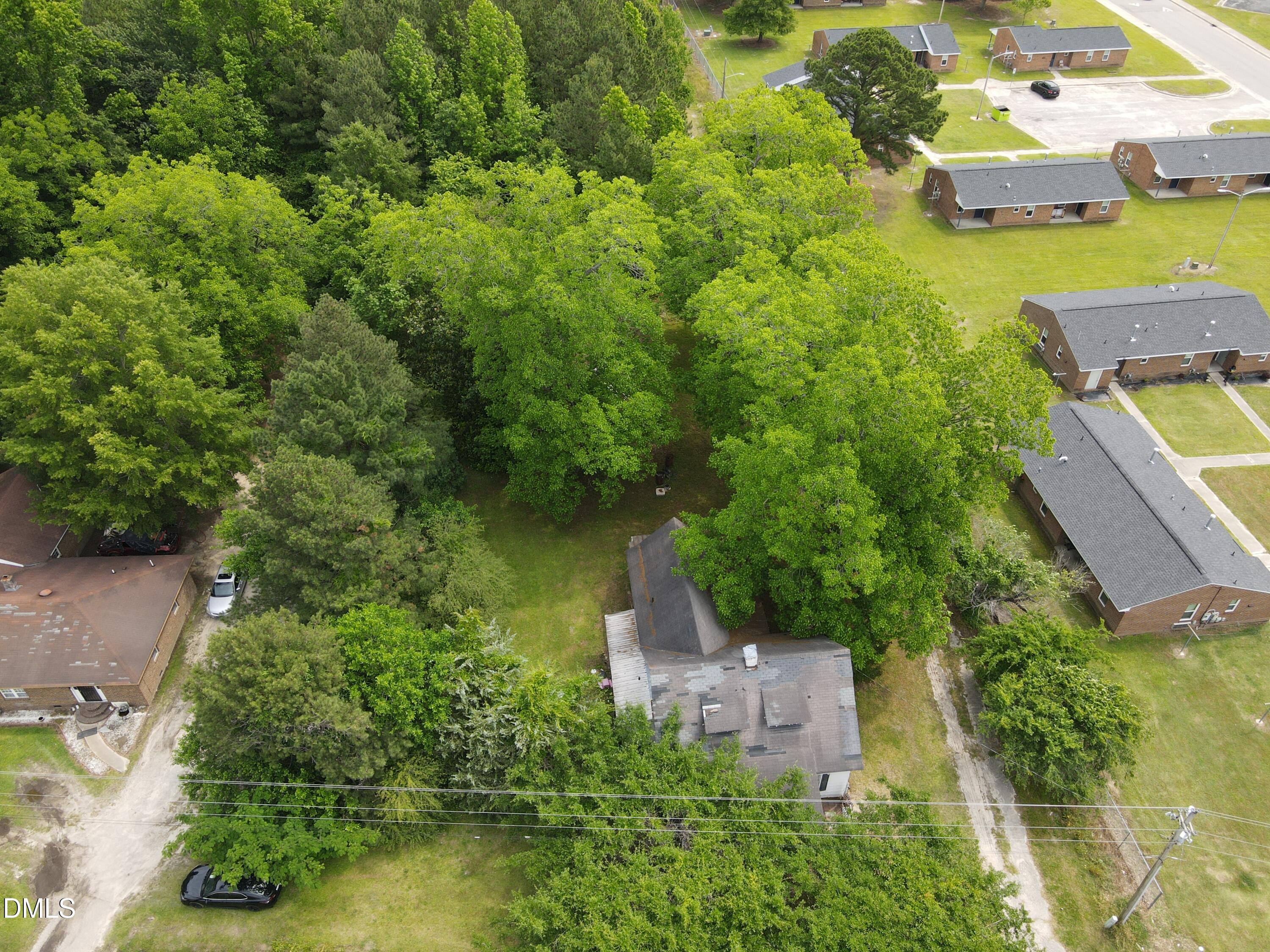 1708-1710 London Church Road Northeast Wilson, NC 27893 - Photo 4 of 27 an aerial view of house with yard swimming pool and outdoor seating