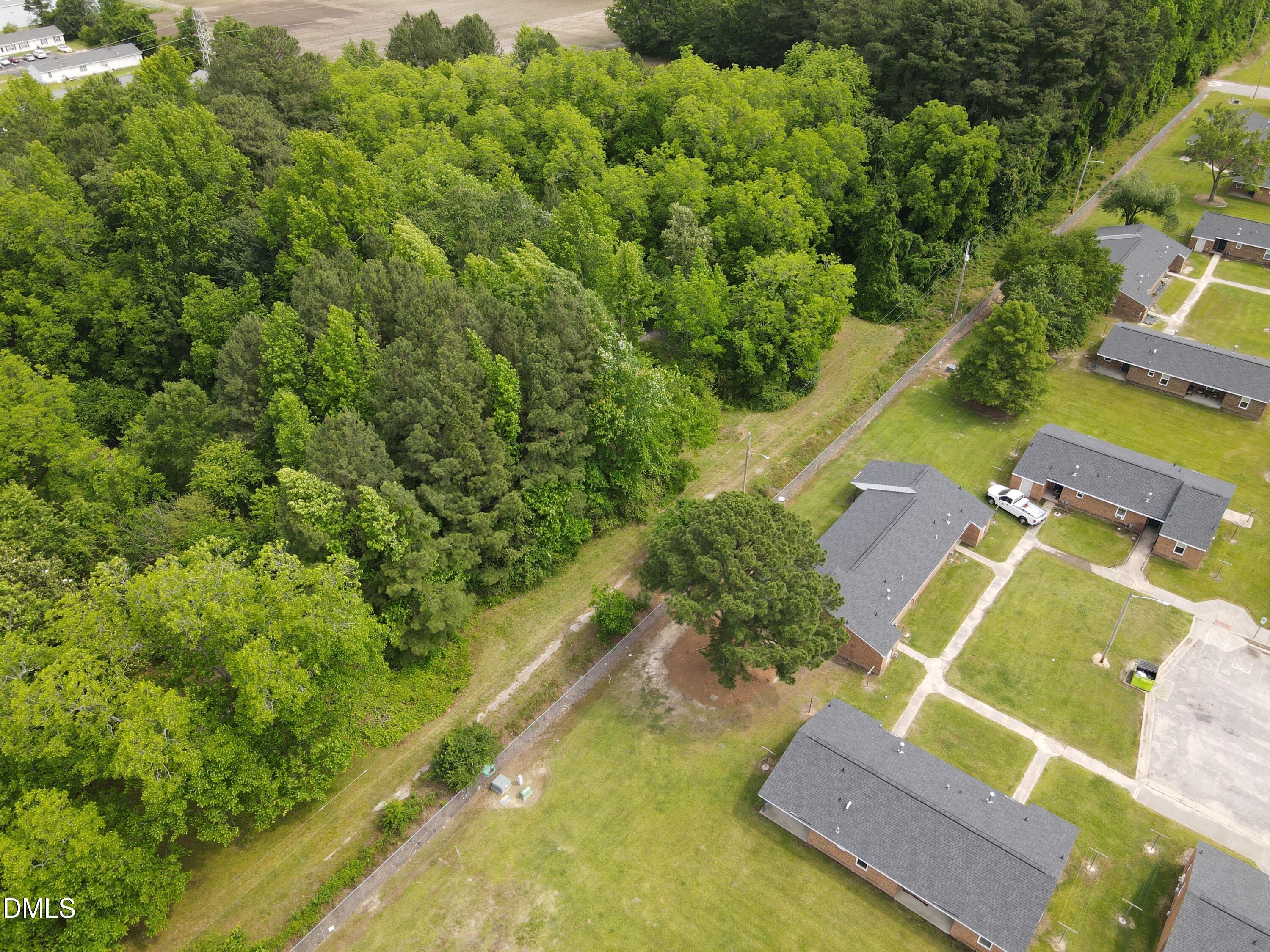 1708-1710 London Church Road Northeast Wilson, NC 27893 - Photo 10 of 27 an aerial view of a house with a yard