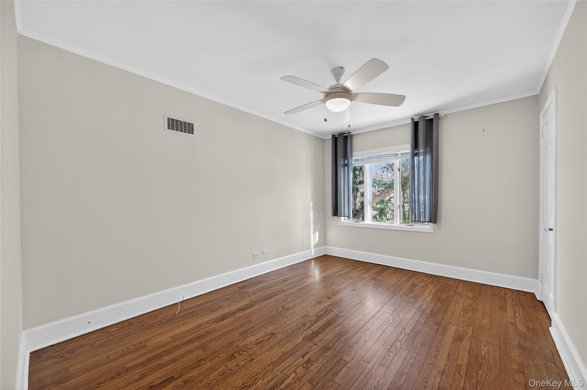 108 La Rue Drive Huntington, NY 11743 - Photo 14 of 27 Bedroom with ceiling fan and hardwood flooring