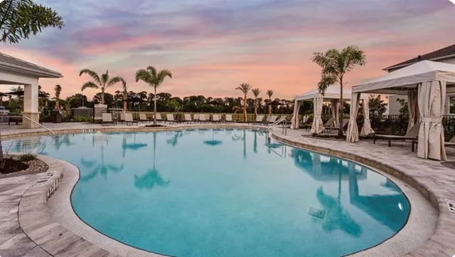 a view of a swimming pool from a balcony